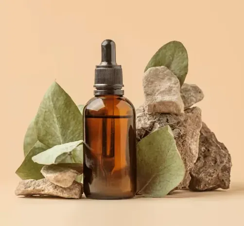 Homeopathic remedy bottle alongside dried herbs